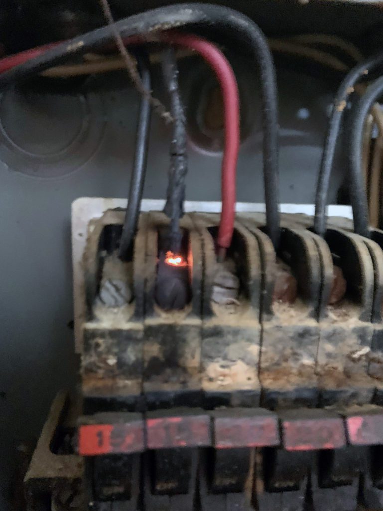 old unsafe breaker arcing electricty